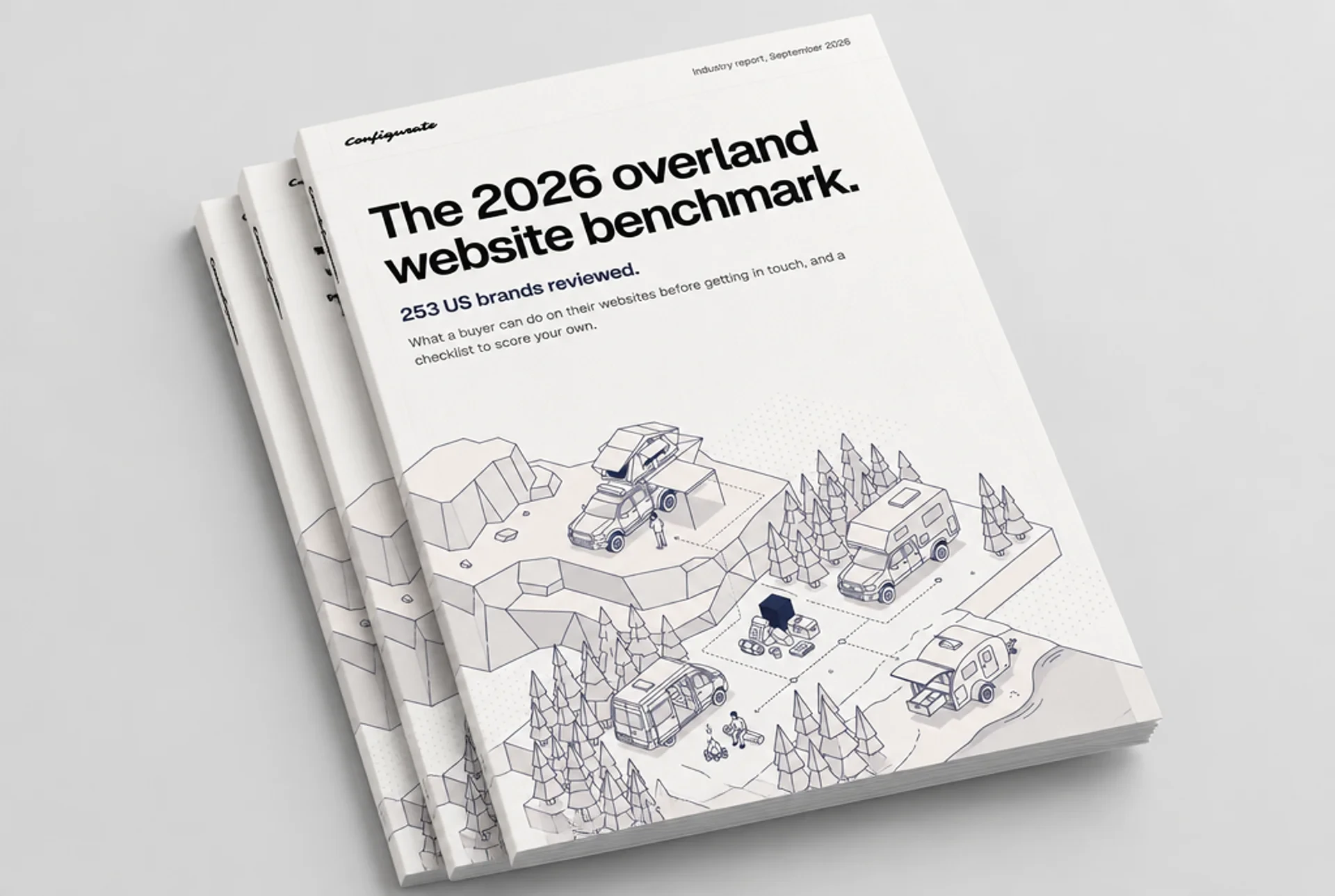 A stack of printed copies of the 2026 overland website benchmark, the top one showing its cover.